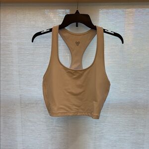 Women's Cream Sports crop top.